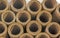 Horizontaly Stacked Collection of Cardboard Packaging Tubes