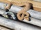 A Horned Viper snake moves through scaffolding on a construction site.