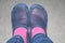 Horrible blue homemade comfortable slippers with pink warm socks