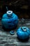 Horribly blue Halloween, painted blue pumpkins and candles