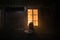 Horror concept. Little baby standing in the yard near a window of old creepy house. Scary baby silhouette in dark. A realistic