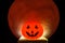 The Horror or scary pumpkin for Halloween Day.There`s a red full moon in the background. Halloween horror concept