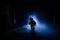 Horror scene of a scary children\'s ghost, Silhouette of scary baby doll on dark foggy background with light