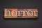 Horror word abstract in vintage letterpress wood type