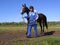 Horse auction demonstration of horses Novosibirsk Hippodrome man leads a horse