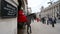 A horse back mounted trooper of the Household Cavalry stand guard in a sentry archway at the entrance to Horse Guards Parade while