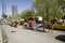 Horse and carriage drives in traffic down Central Park West in Manhattan, New York City, NY