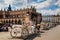 Horse carriages at the main square Rynek Glowny in Krakow old town