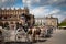 Horse carriages at the main square Rynek Glowny in Krakow old town