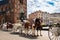 Horse carriages at the main square Rynek Glowny in Krakow old town