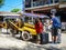 Horse carts carry tourists on street in Gili Meno island, Indonesia