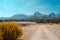 Horse corral and dirt road near Dubois Wyoming on autumn fall day