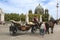 Horse-drawn carriage with coachwoman at Berliner Cathedral, Berlin