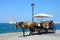 Horse drawn carriage and lighthouse, Chania.