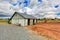 Horse farm land with barn.