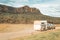 Horse float pulled by four wheel drive along a dirt road in rural Australia