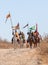 Horse and foot warriors - participants in the reconstruction of Horns of Hattin battle in 1187, move in marching formation to the