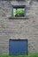 Horse Heads in Old Stone Building Window Frame