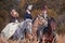 Horse-hunting with riders in riding habit