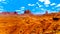 Horse at John Ford Point and towering red sandstone formations of Sentinel Mesa, Merrick Butte, Mitten Buttes in Monument Valley