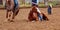 Horse Lies On Ground With Light Rain Falling