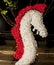 A horse made by white and red paper