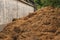 Horse manure pile behind the stable