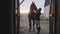 Horse Owner Standing With Her Dark Brown Horse View From The Door Of The Stable