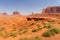 Horse and people at John Ford`s Point. View on Merrick Butte and East Mitten Butte.