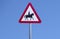 Horse pony riding beware warning sign in blue sky road animal danger of accident equestrian centre near in rural countryside