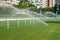 Horse racing track with sprinkler