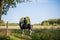 Horse ride of a young girl in places with beautiful autumn countryside landscapes