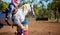 Horse And Rider Competing In Barrel Race At Outback Country Rodeo