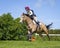 Horse rider competing in Cross Country Event.