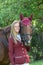 Horse and rider dressed up for a competition