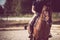 Horse rider on a parkour after equestrian training. Show jumping training