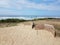 Horse shoe pits with sand near beach with ocean waves