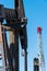 Horsehead pumpjack with a blue sky background