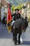 Horseman holding flag during Brasov Juni parade