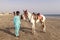 Horsemen in Karachi Beach, Pakistan