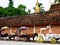 Horses drawn carriage wait travelers thai people use service tour around city at Wat Phra That Lampang Luang in Lampang, Thailand