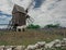 Horses in front of windmill in Ã–land, Sweden