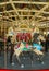 Horses on a traditional fairground B&B carousel at historic Coney Island Boardwalk in Brooklyn