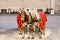 Horses with wagons in winter on the main square of Salzburg in Austria. Entertainment of tourists, riding. Vacation