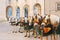 Horses with wagons in winter on the main square of Salzburg in Austria. Entertainment of tourists, riding. Vacation