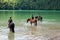 Horses in the weissensee lake in the alps near fuessen, allgaeu, bavaria,germany