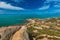 Horseshoe Bay at Bowen - iconic beach with granite climbing rock