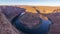 Horseshoe bend on sunny morning. Colorado River Meander. Arizona, USA