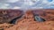 Horseshoe Bend - Tourist man with panoramic aerial view of Horseshoe bend on the Colorado river near Page in summer, Arizona, USA