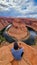 Horseshoe Bend - Tourist man with panoramic aerial view of Horseshoe bend on the Colorado river near Page in summer, Arizona, USA